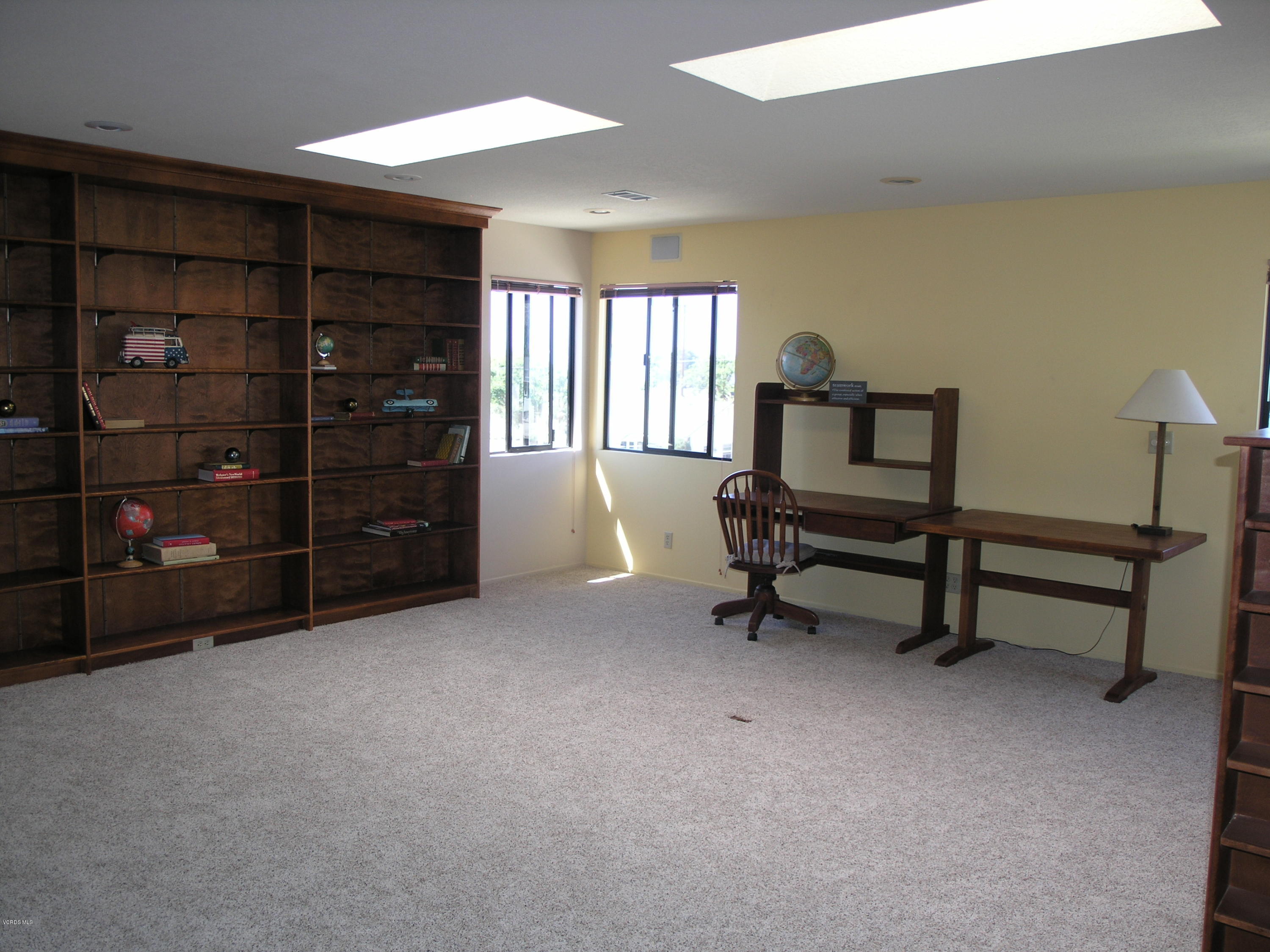 398 Day Road Ventura, CA 93003 - Photo 14 of 28 a living room with furniture and a lamp