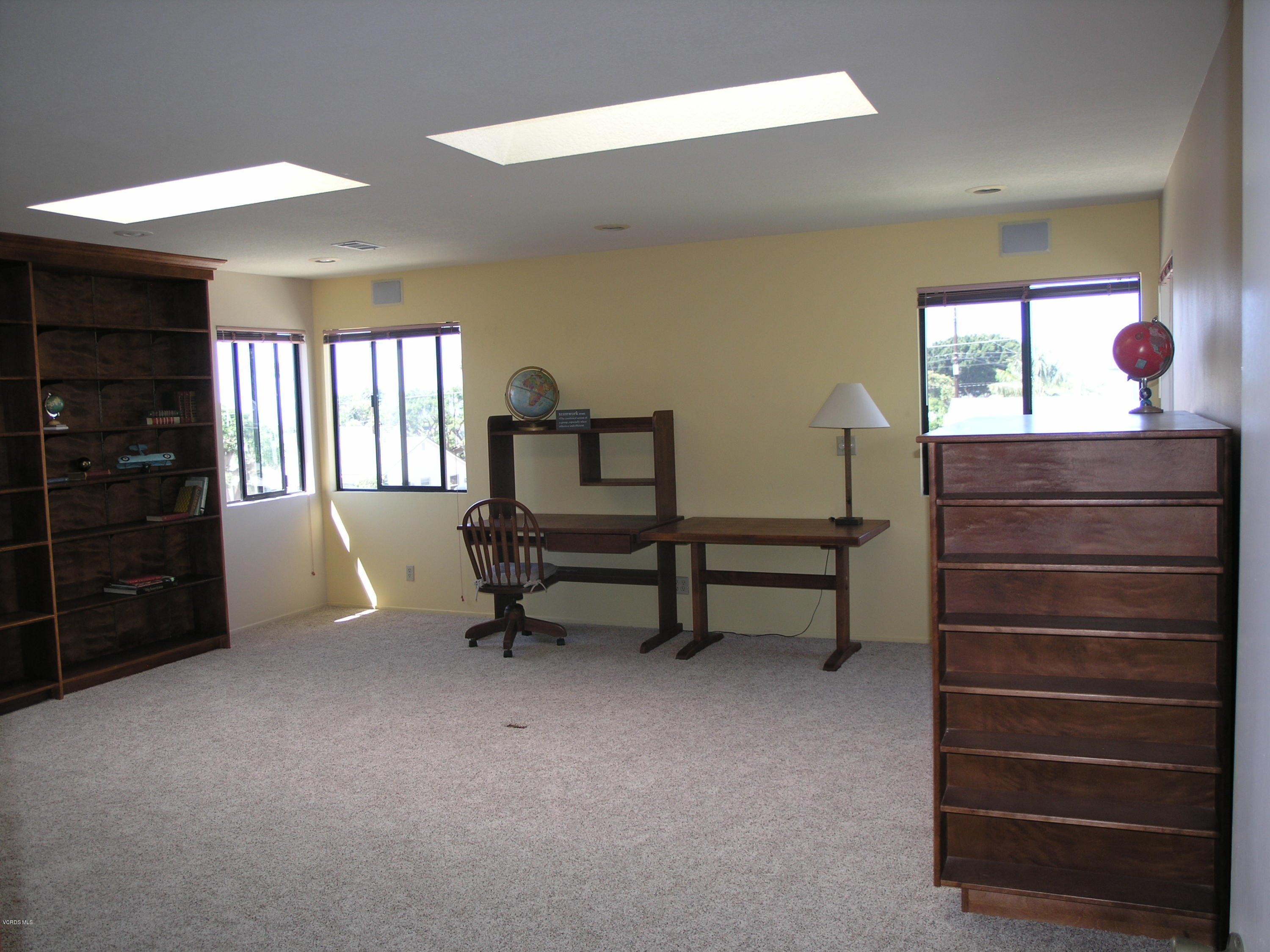 398 Day Road Ventura, CA 93003 - Photo 16 of 28 a living room with furniture and a closet