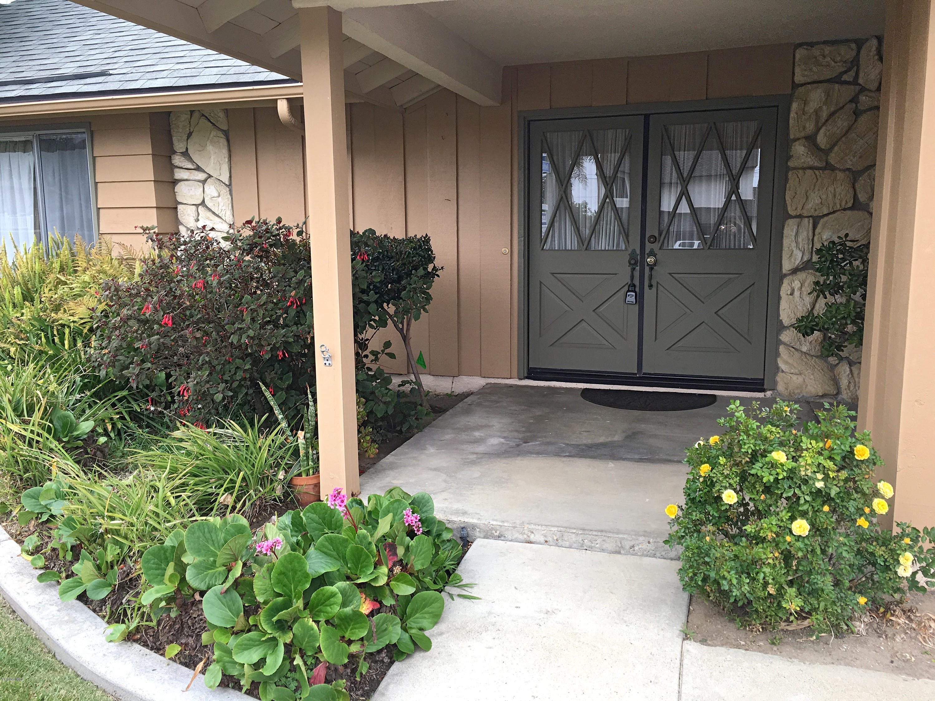 398 Day Road Ventura, CA 93003 - Photo 18 of 28 a couple of potted plants in front of door