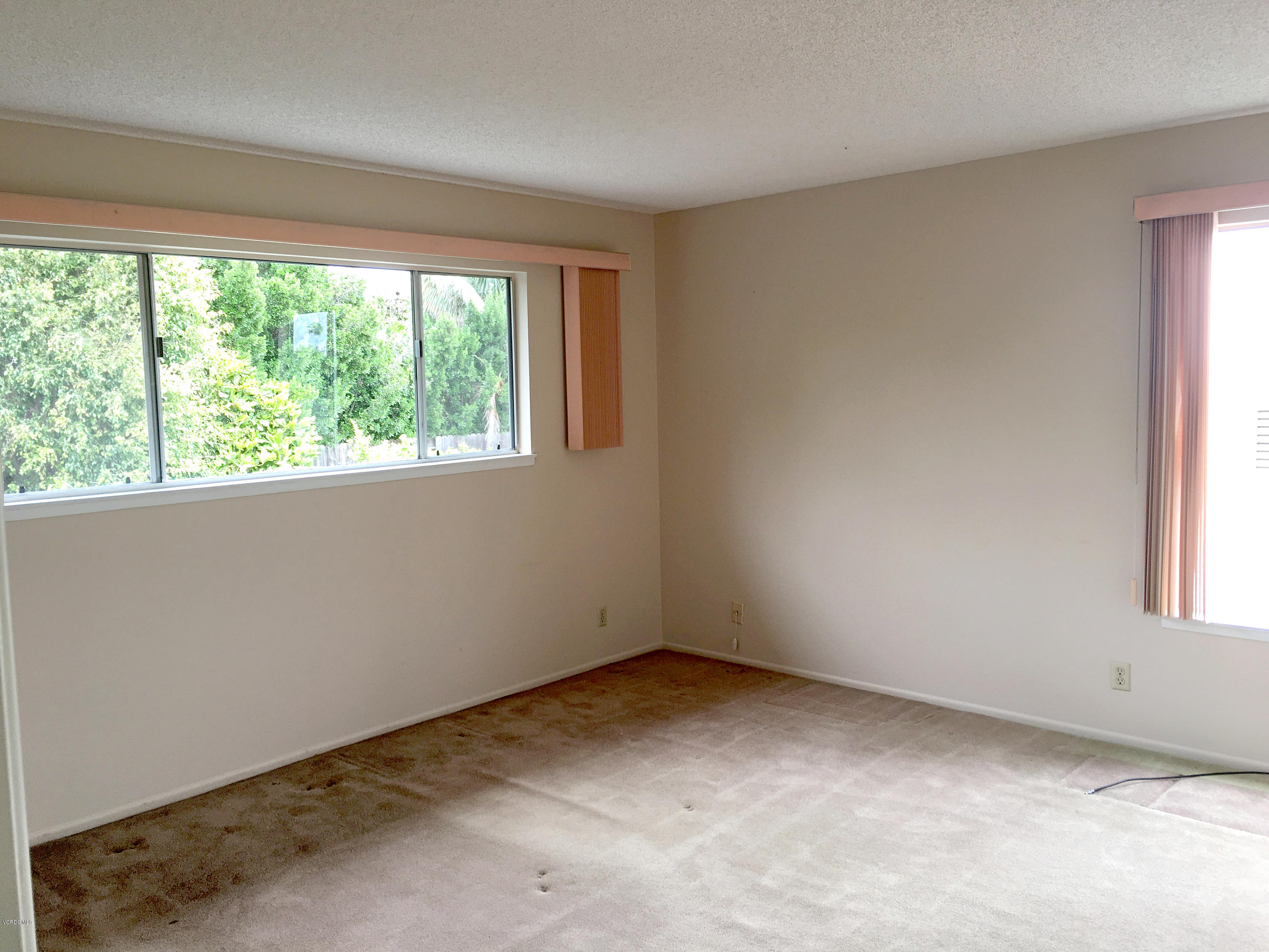 398 Day Road Ventura, CA 93003 - Photo 3 of 28 an empty room with a window