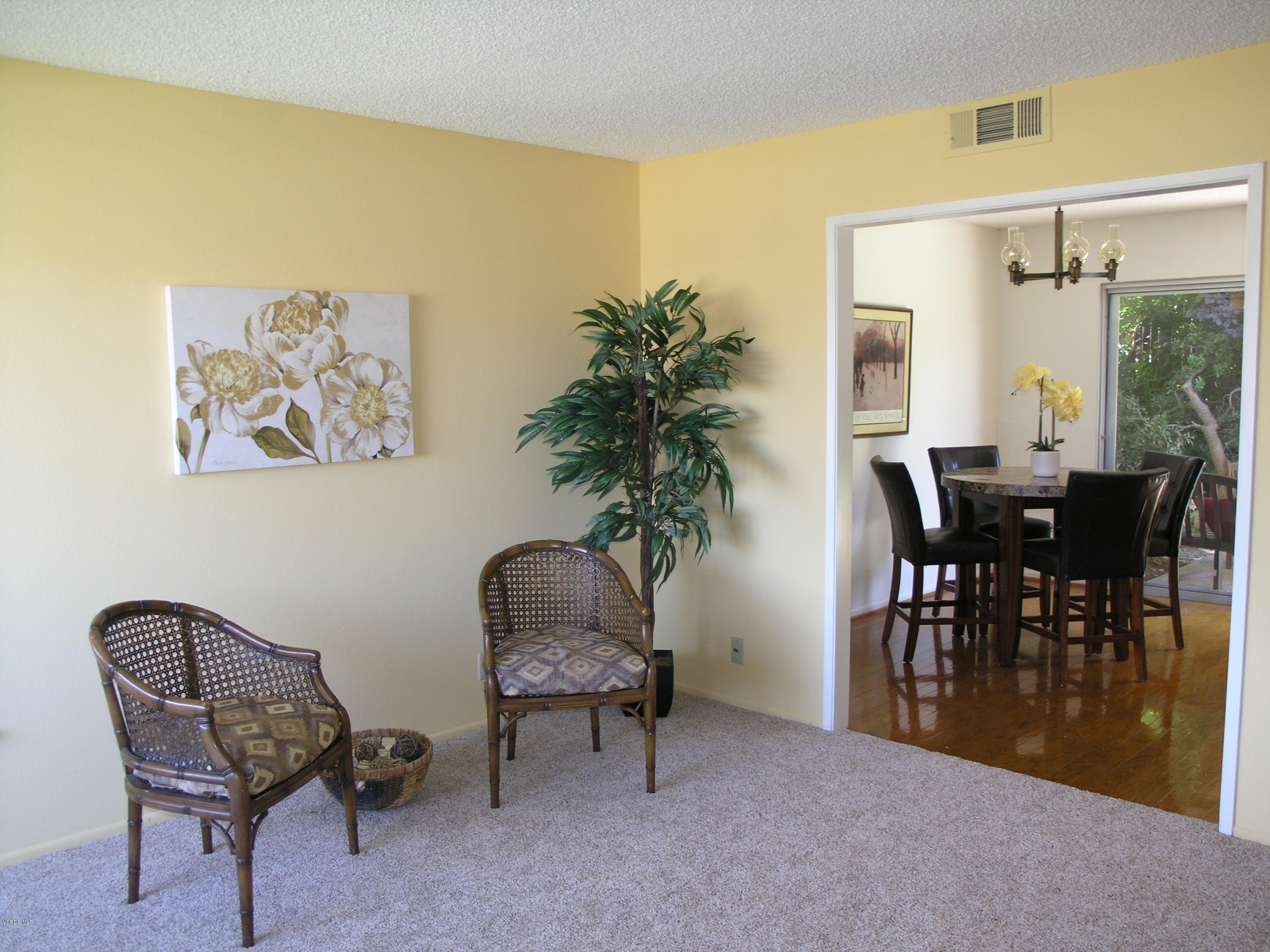 398 Day Road Ventura, CA 93003 - Photo 7 of 28 a view of a livingroom with furniture and a potted plant