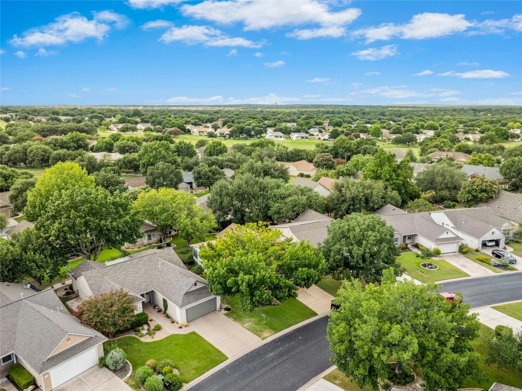 113 Coreopsis Way Georgetown, TX 78633 - Photo 1 of 34 an aerial view of residential houses with outdoor space