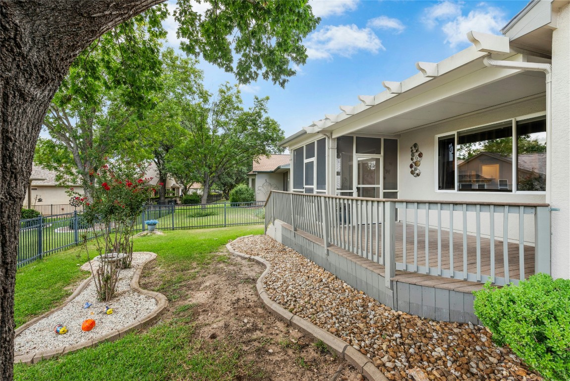 113 Coreopsis Way Georgetown, TX 78633 - Photo 24 of 34 a front view of a house with garden