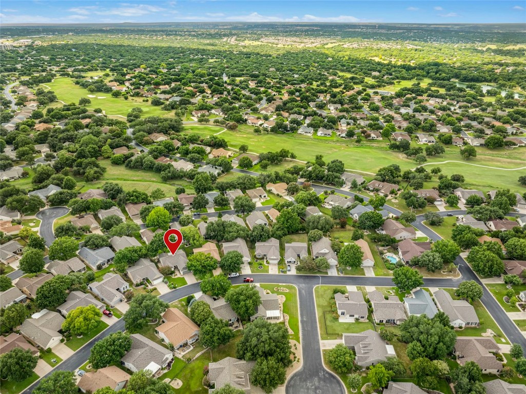 113 Coreopsis Way Georgetown, TX 78633 - Photo 26 of 34 a view of a lush green field
