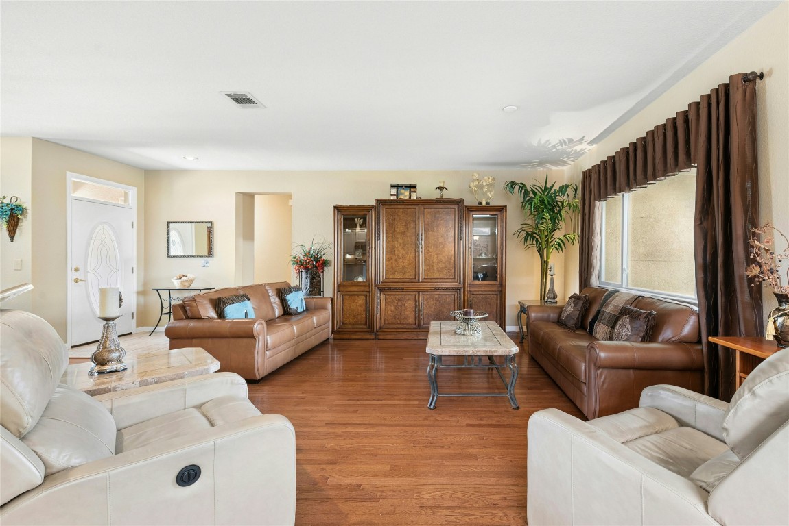 113 Coreopsis Way Georgetown, TX 78633 - Photo 6 of 34 a living room with furniture and a large window