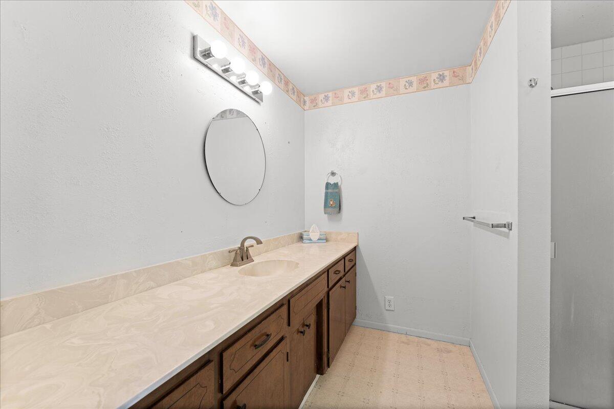 4093 Old Upton Road Central Point, OR 97502 - Photo 18 of 23 a bathroom with a sink and a mirror