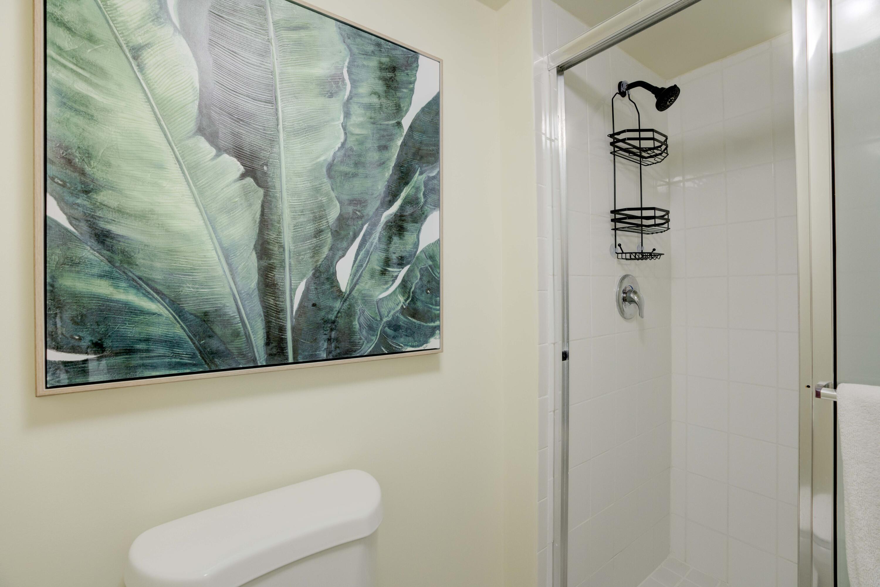630 Ocean Drive, Unit 302 Juno Beach, FL 33408 - Photo 17 of 40 a bathroom with a shower
