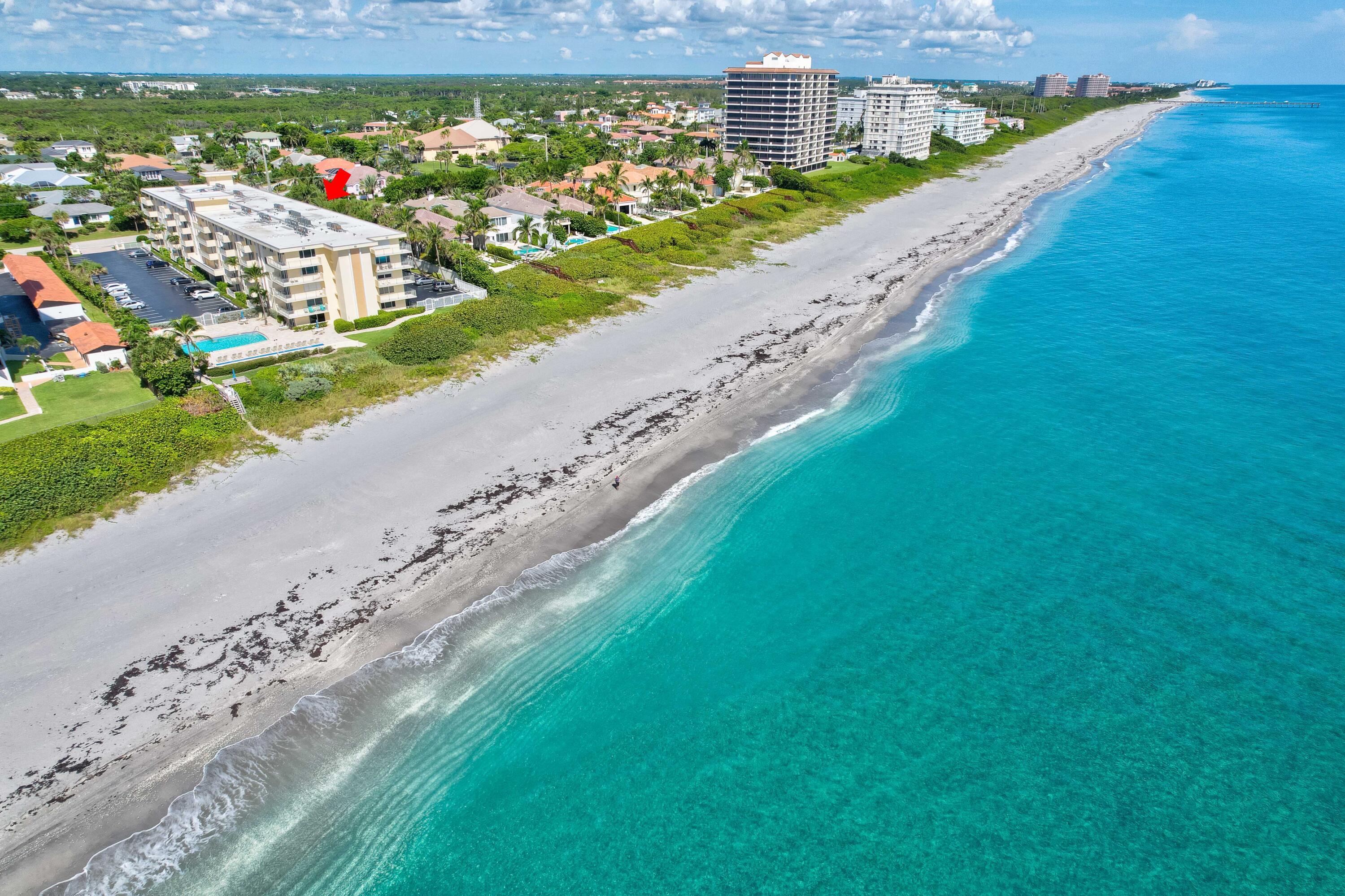 630 Ocean Drive, Unit 302 Juno Beach, FL 33408 - Photo 27 of 40 a view of a city with a lake