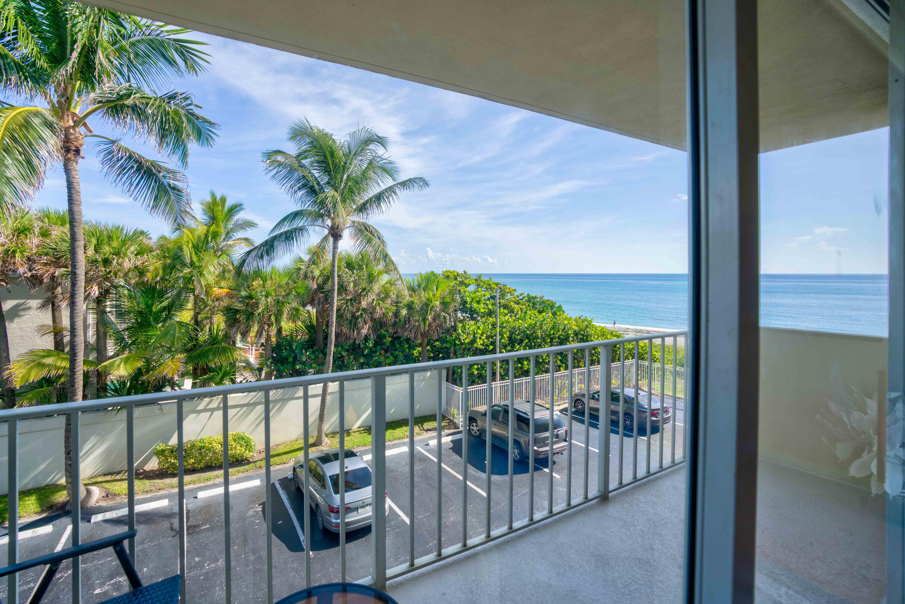 630 Ocean Drive, Unit 302 Juno Beach, FL 33408 - Photo 40 of 40 a view of a balcony with chairs