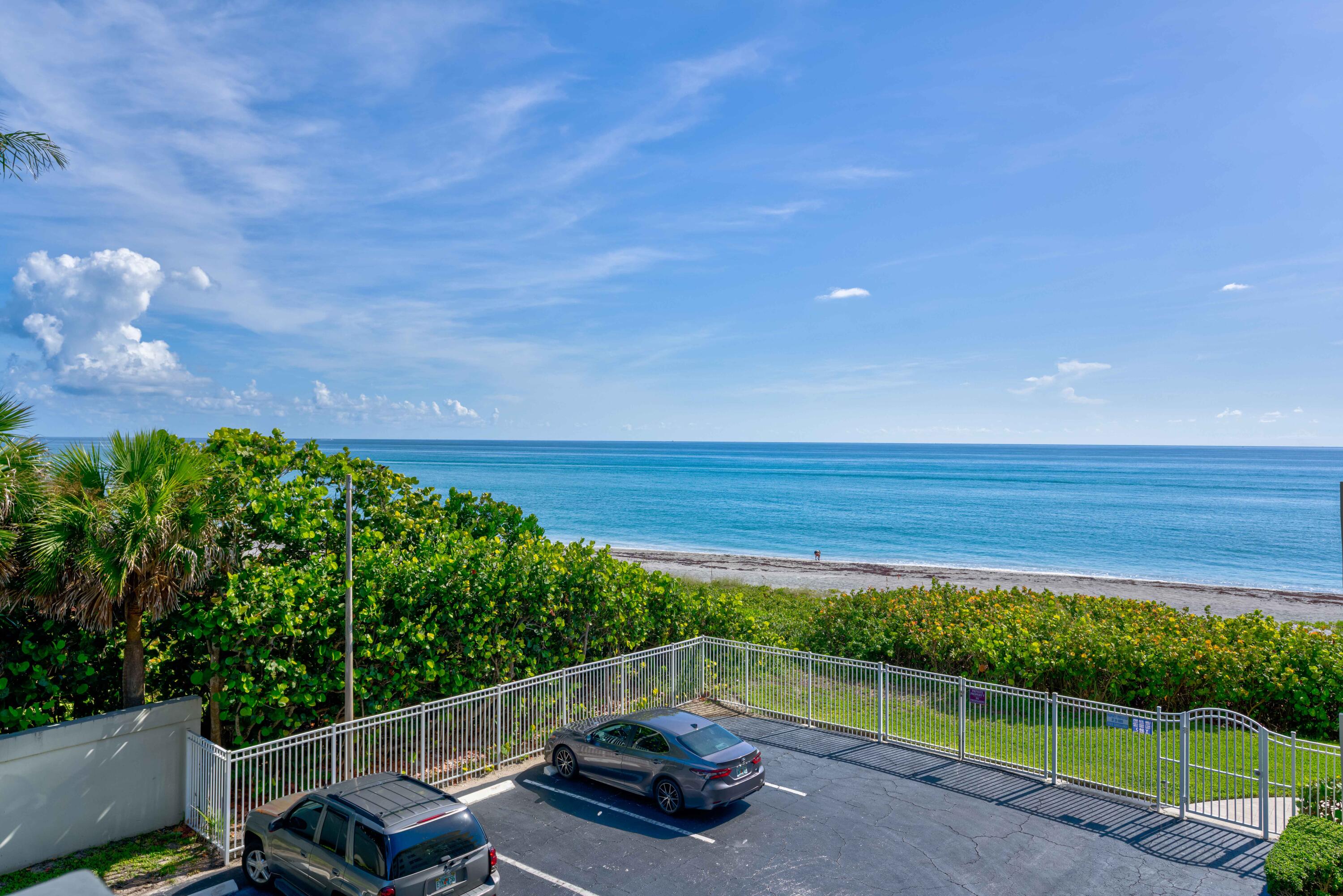 630 Ocean Drive, Unit 302 Juno Beach, FL 33408 - Photo 5 of 40 a view of a backyard with sitting area