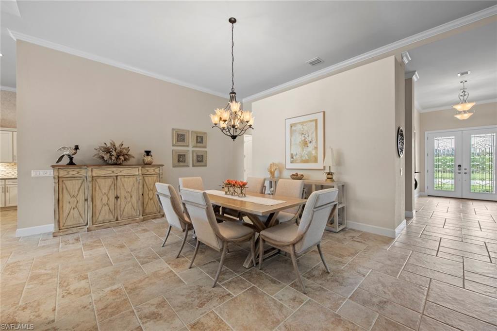 20762 Corkscrew Shores Boulevard Estero, FL 33928 - Photo 11 of 32 a dining room with furniture and window