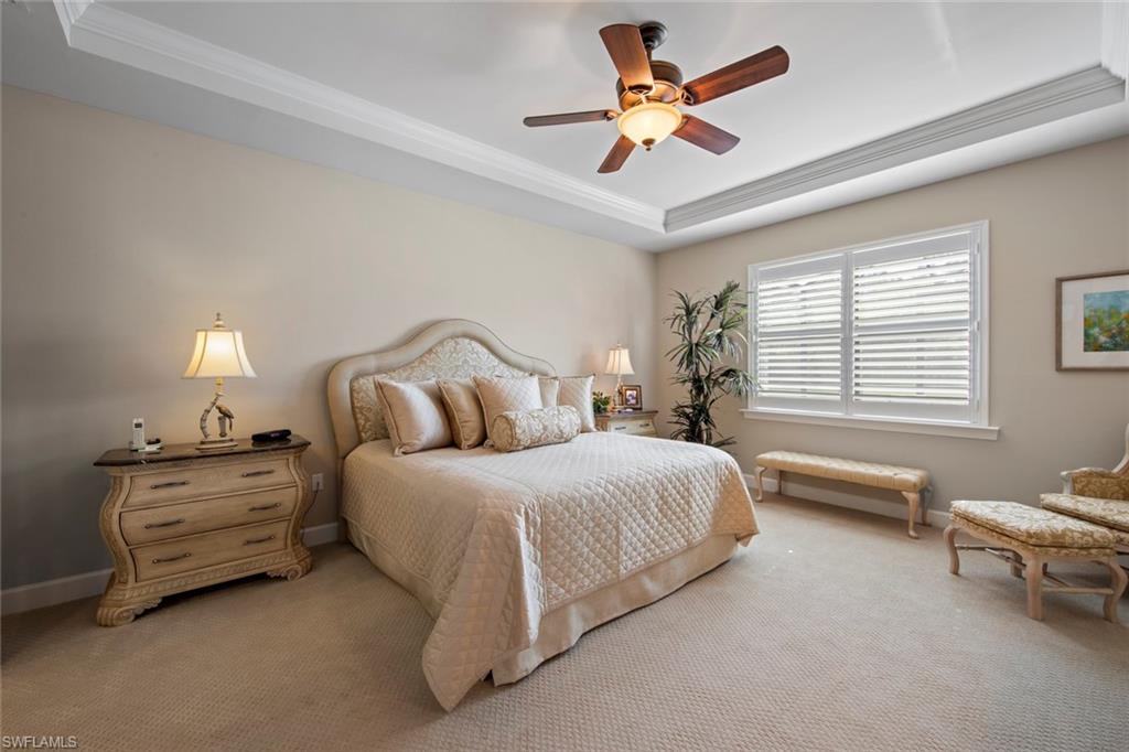 20762 Corkscrew Shores Boulevard Estero, FL 33928 - Photo 14 of 32 a bedroom with bed and window
