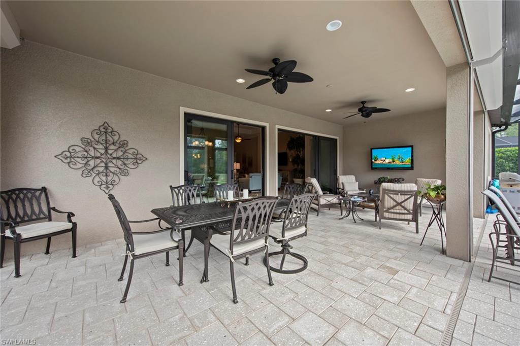 20762 Corkscrew Shores Boulevard Estero, FL 33928 - Photo 22 of 32 a view of a dining room with furniture window and outside view