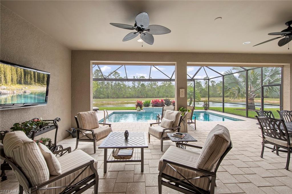 20762 Corkscrew Shores Boulevard Estero, FL 33928 - Photo 24 of 32 a living room with furniture and a large window
