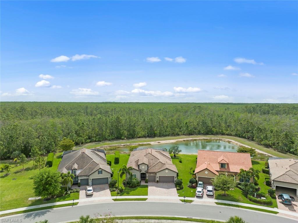 20762 Corkscrew Shores Boulevard Estero, FL 33928 - Photo 31 of 32 a view of swimming pool and outdoor seating