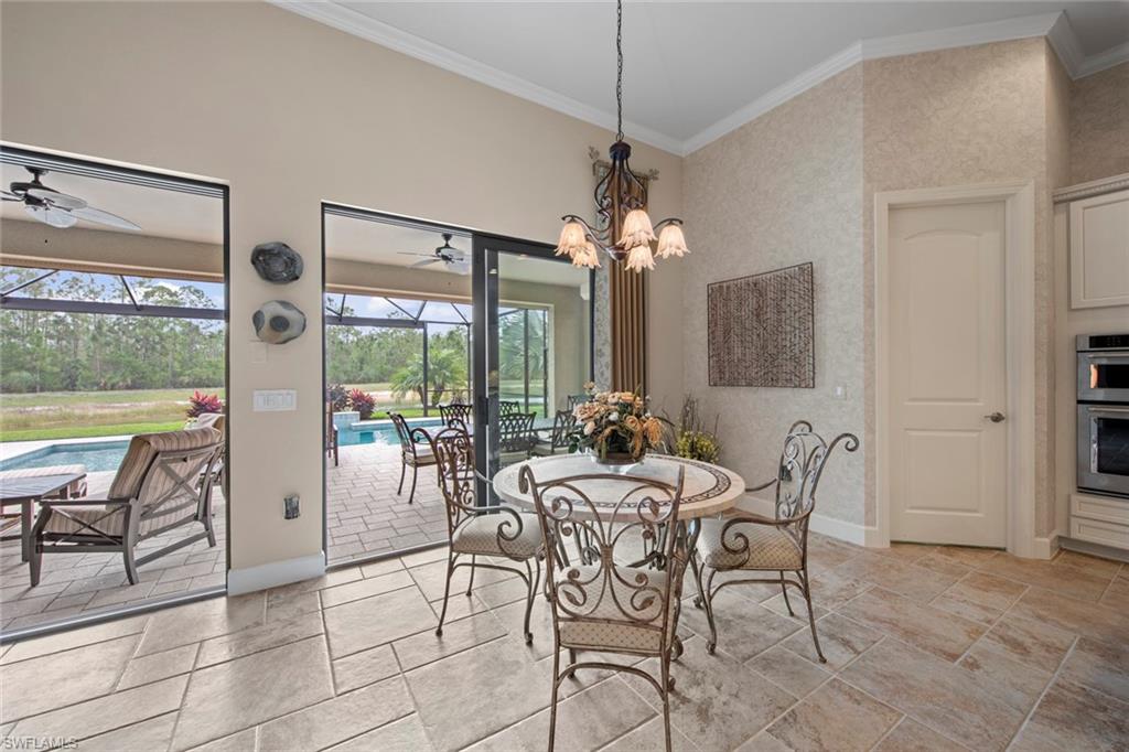 20762 Corkscrew Shores Boulevard Estero, FL 33928 - Photo 5 of 32 a view of a dining room with furniture window and outside view