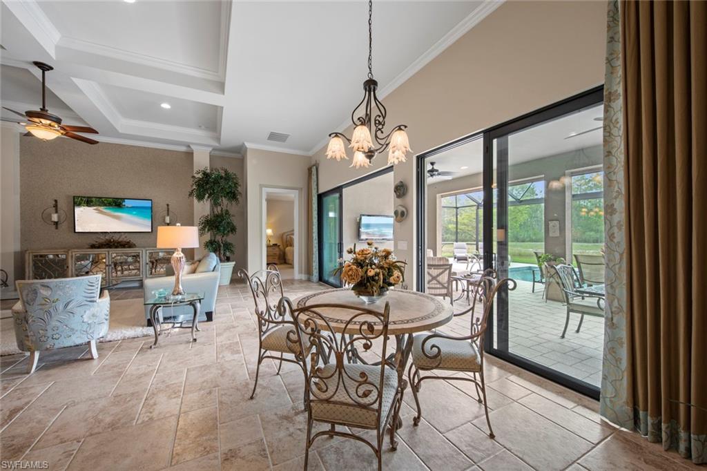 20762 Corkscrew Shores Boulevard Estero, FL 33928 - Photo 6 of 32 a view of a dining room with furniture window and outside view