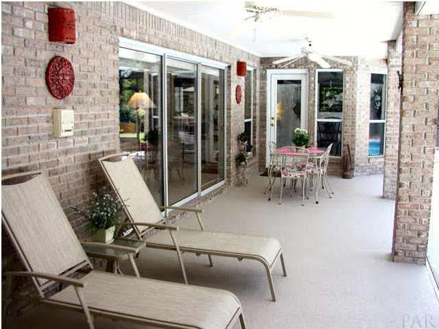 2565 Crescent Road Navarre, FL 32566 - Photo 5 of 15 HUGE PATIO WITH BRICK COLUMNS