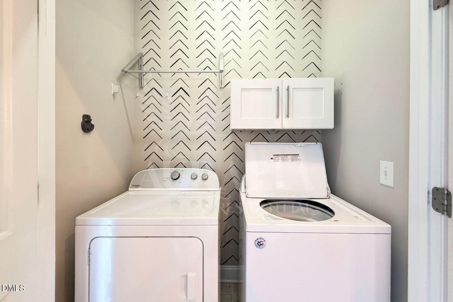 7754 ACC Boulevard Raleigh, NC 27617 - Photo 15 of 41 a utility room with dryer and washer