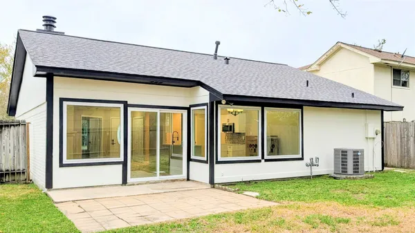 a house view with a outdoor space