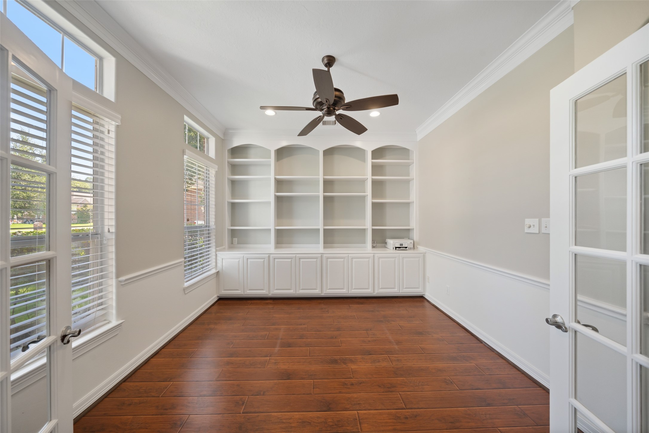 2302 Legends Shore Drive Spring, TX 77386 - Photo 8 of 48 Bright home office with custom built-ins and abundant natural light.