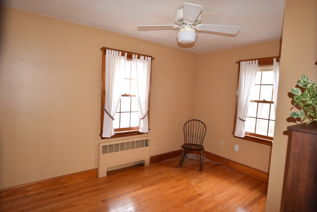 42 Herbert Street Wakefield, MA 01880 - Photo 11 of 16 a room with window and stairs