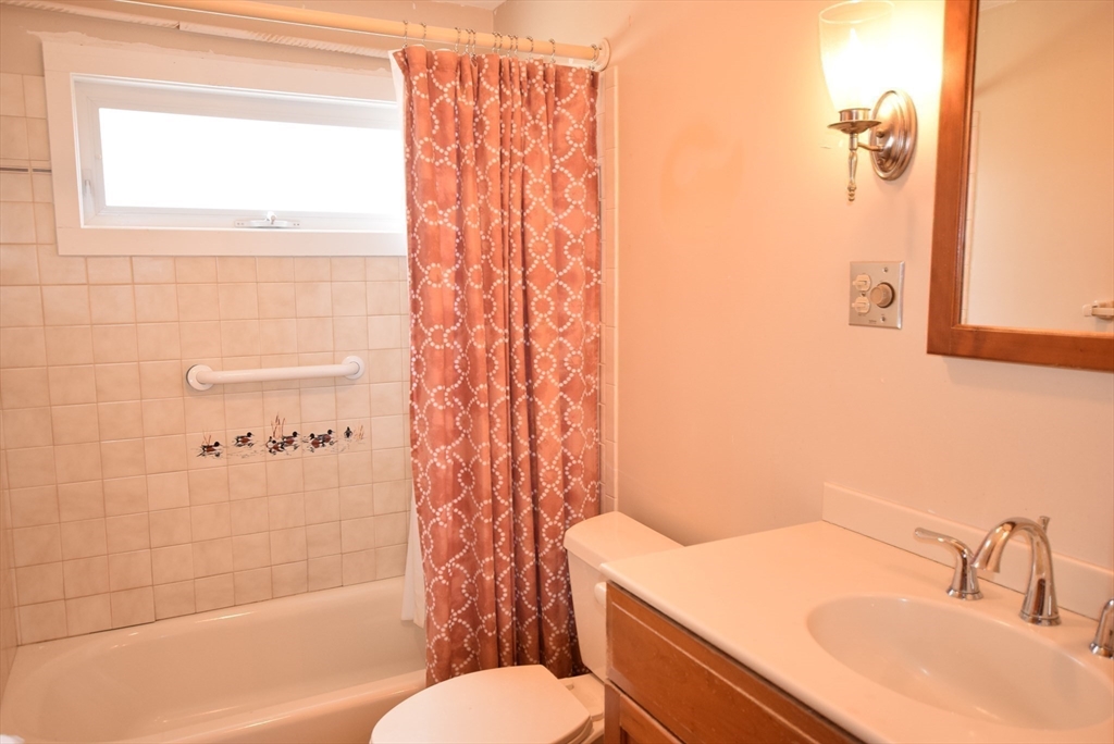 42 Herbert Street Wakefield, MA 01880 - Photo 13 of 16 a bathroom with a sink toilet and shower