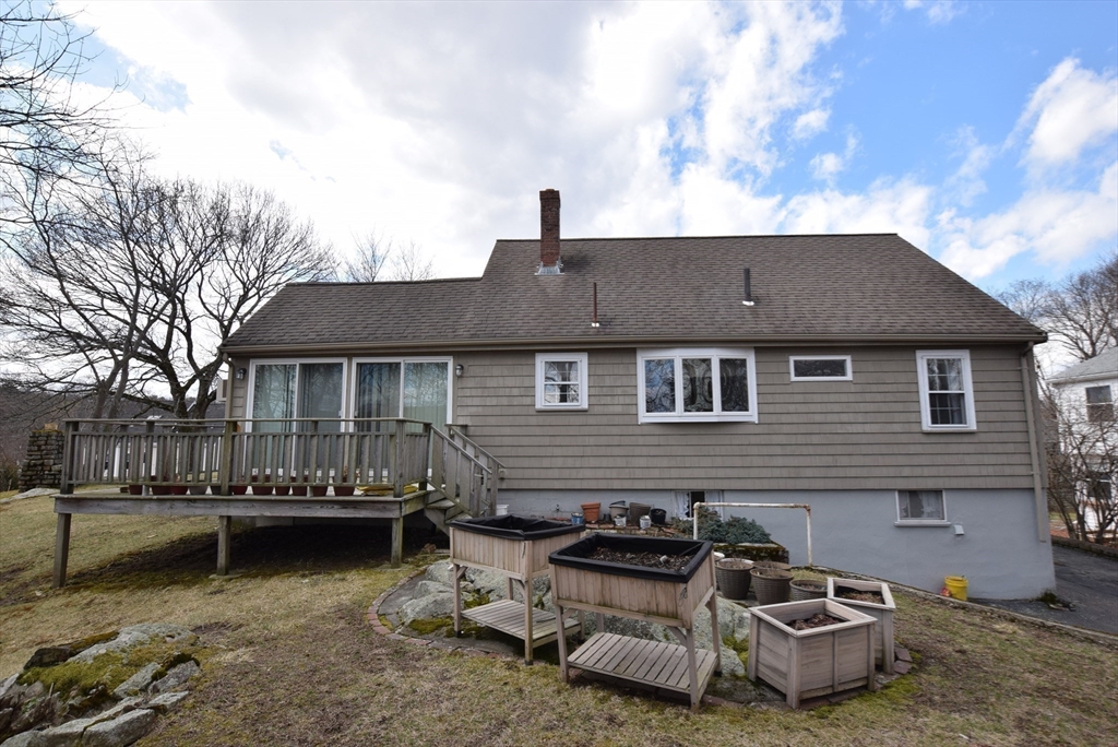 42 Herbert Street Wakefield, MA 01880 - Photo 16 of 16 a front view of a house with a yard