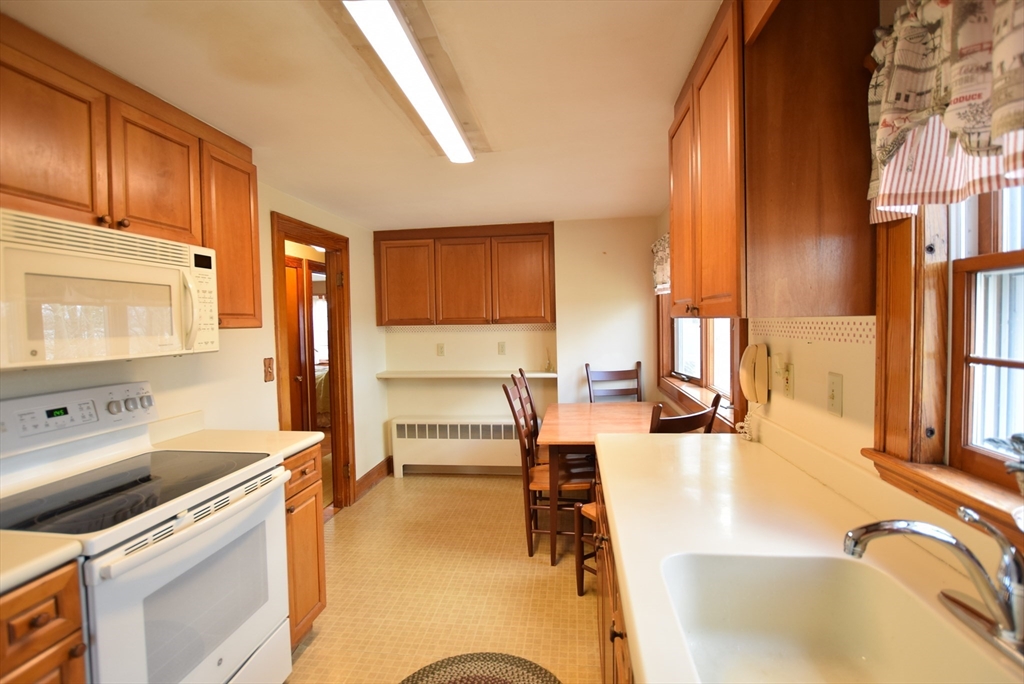 42 Herbert Street Wakefield, MA 01880 - Photo 3 of 16 a living room with stainless steel appliances granite countertop furniture and a kitchen view