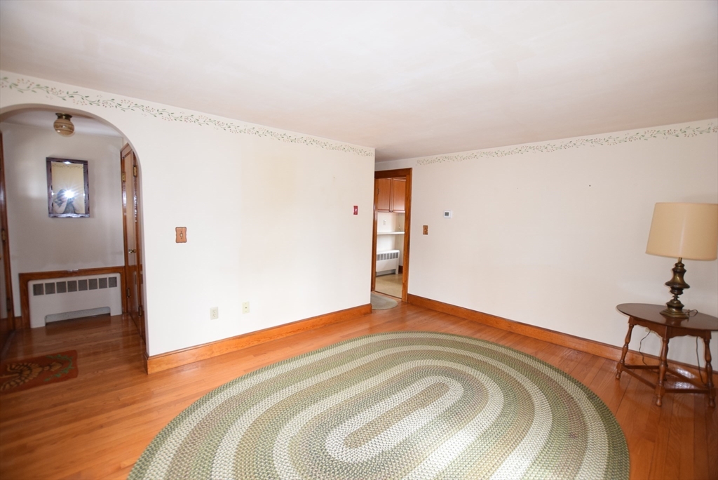 42 Herbert Street Wakefield, MA 01880 - Photo 7 of 16 a view of a livingroom with wooden floor