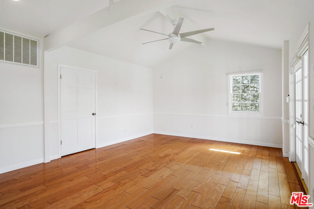 131 Reef Mall Marina del Rey, CA 90292 - Photo 36 of 43 an empty room with wooden floor closet and windows