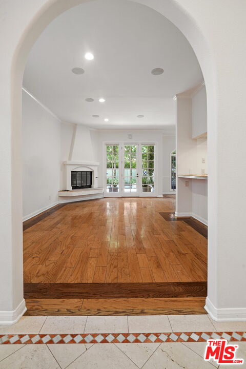 131 Reef Mall Marina del Rey, CA 90292 - Photo 6 of 43 a room with wooden floor and kitchen view