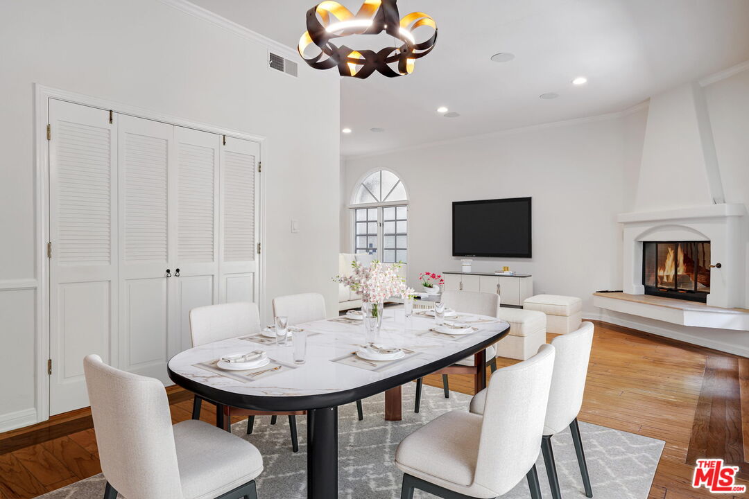 131 Reef Mall Marina del Rey, CA 90292 - Photo 10 of 43 a view of a dining room with furniture and wooden floor