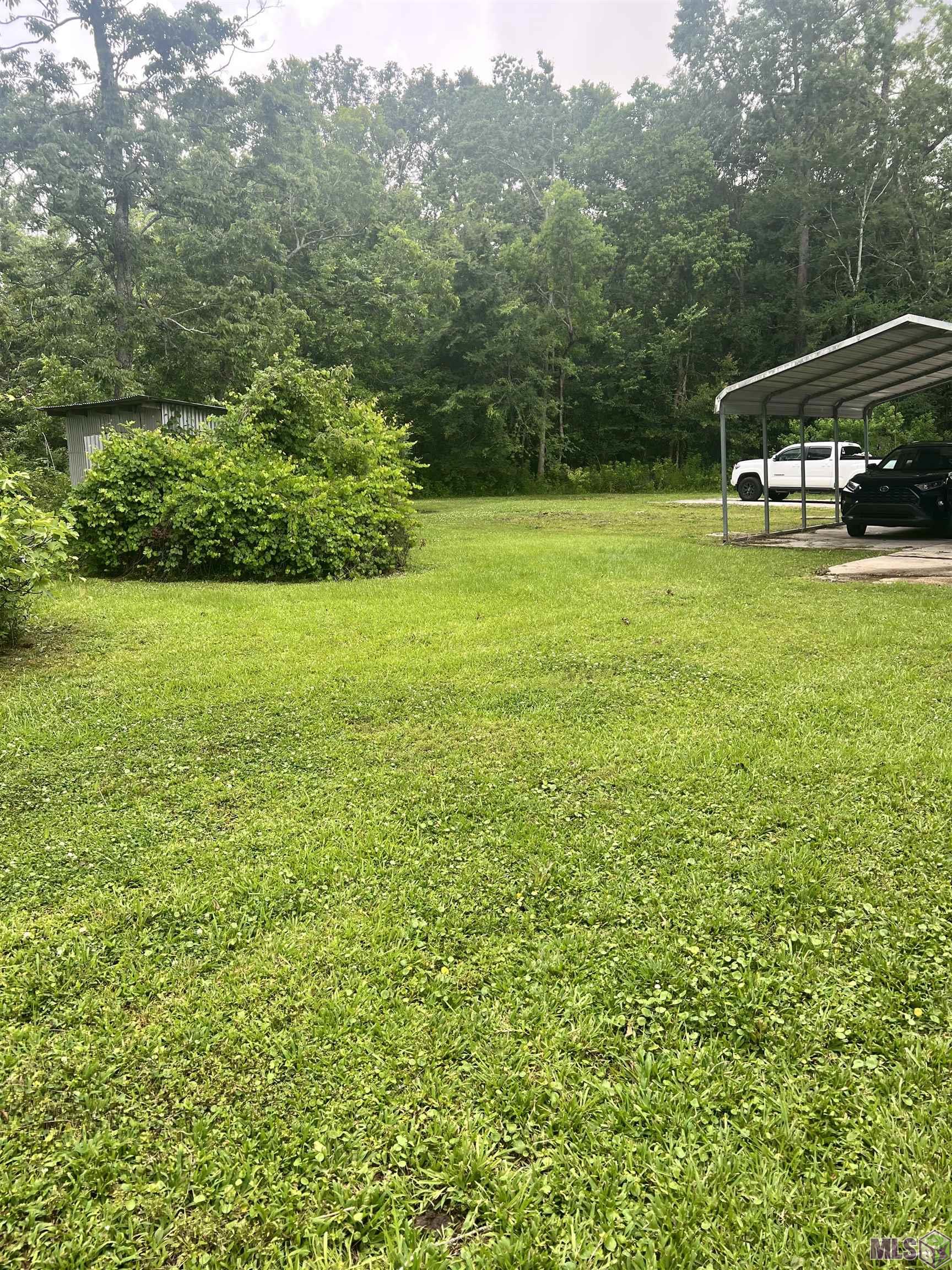 631 Tobey Road Gonzales, LA 70737 - Photo 4 of 36 Covered rear parking