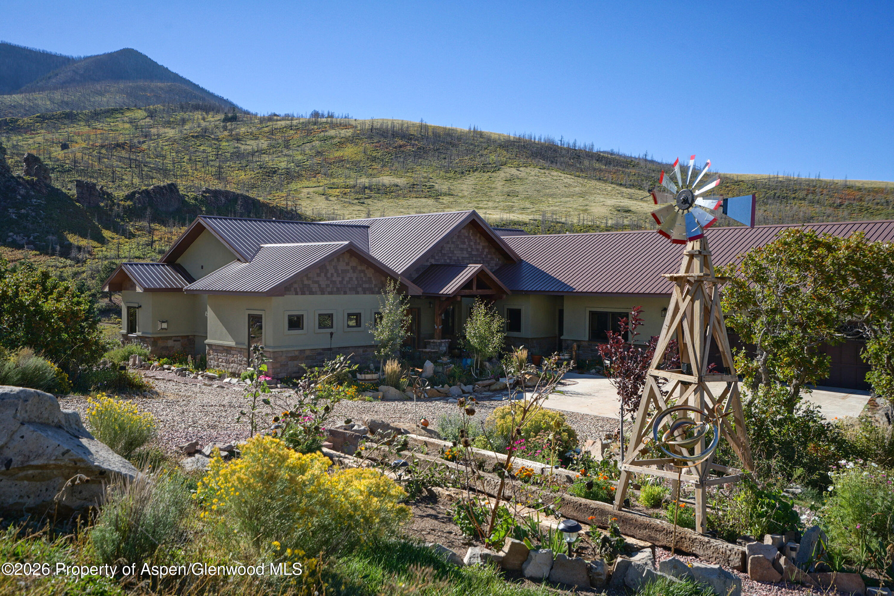 1833 Yellowstone Creek Road Gardner, CO 81040 - Photo 2 of 50 a view of house with yard and sitting area