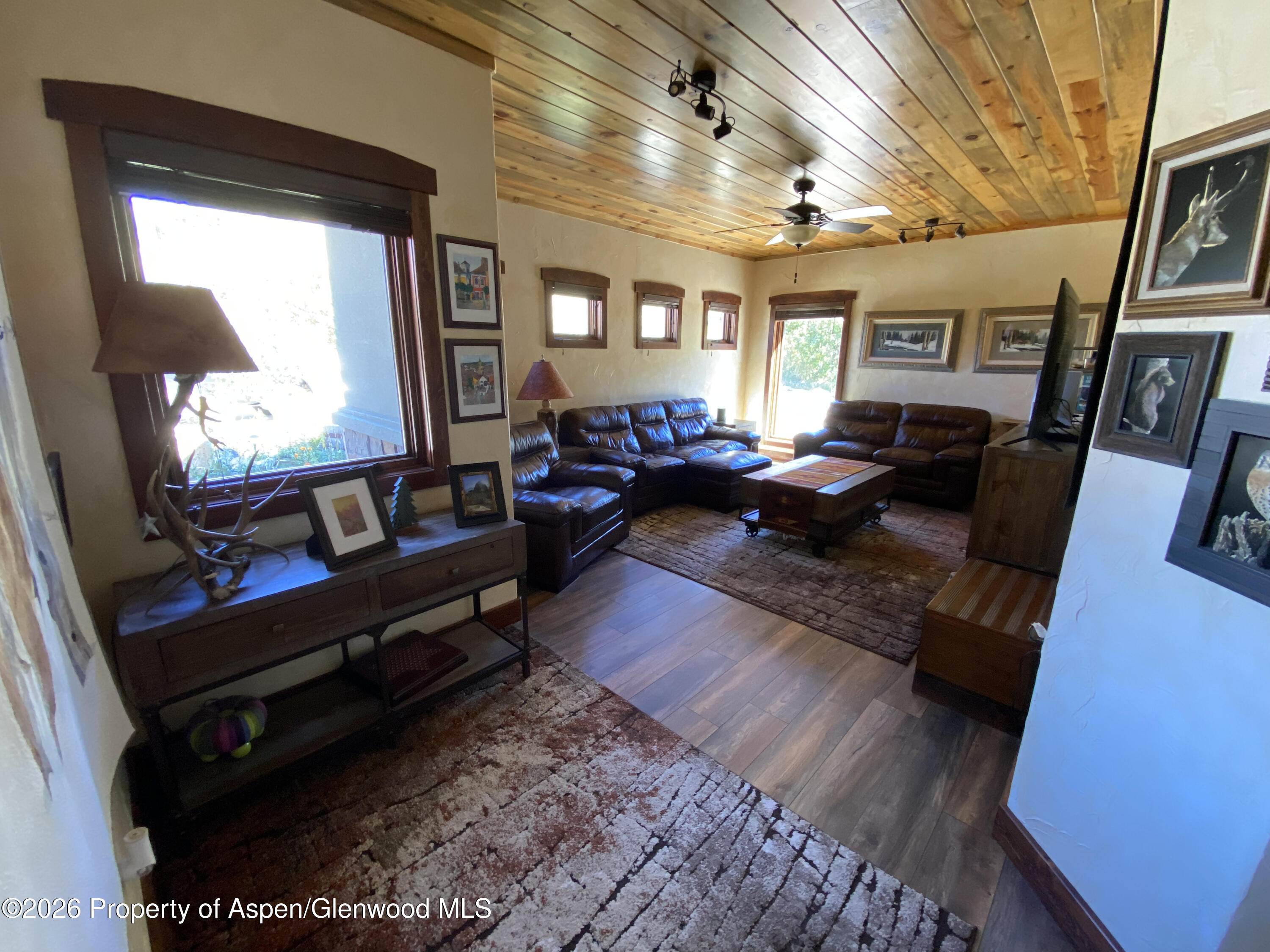 1833 Yellowstone Creek Road Gardner, CO 81040 - Photo 22 of 50 a living room with furniture and a flat screen tv