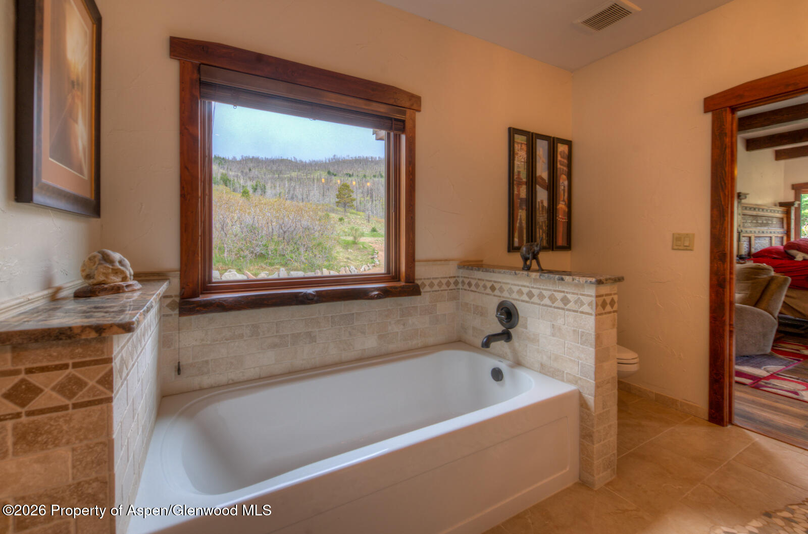 1833 Yellowstone Creek Road Gardner, CO 81040 - Photo 27 of 50 a bathroom with a tub and a window
