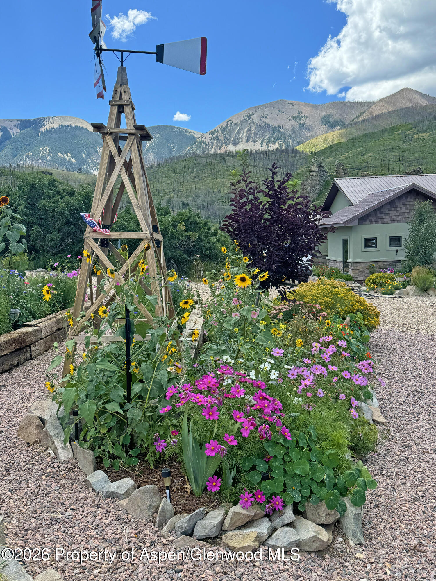 1833 Yellowstone Creek Road Gardner, CO 81040 - Photo 41 of 50 a view of a house with a yard and a garden