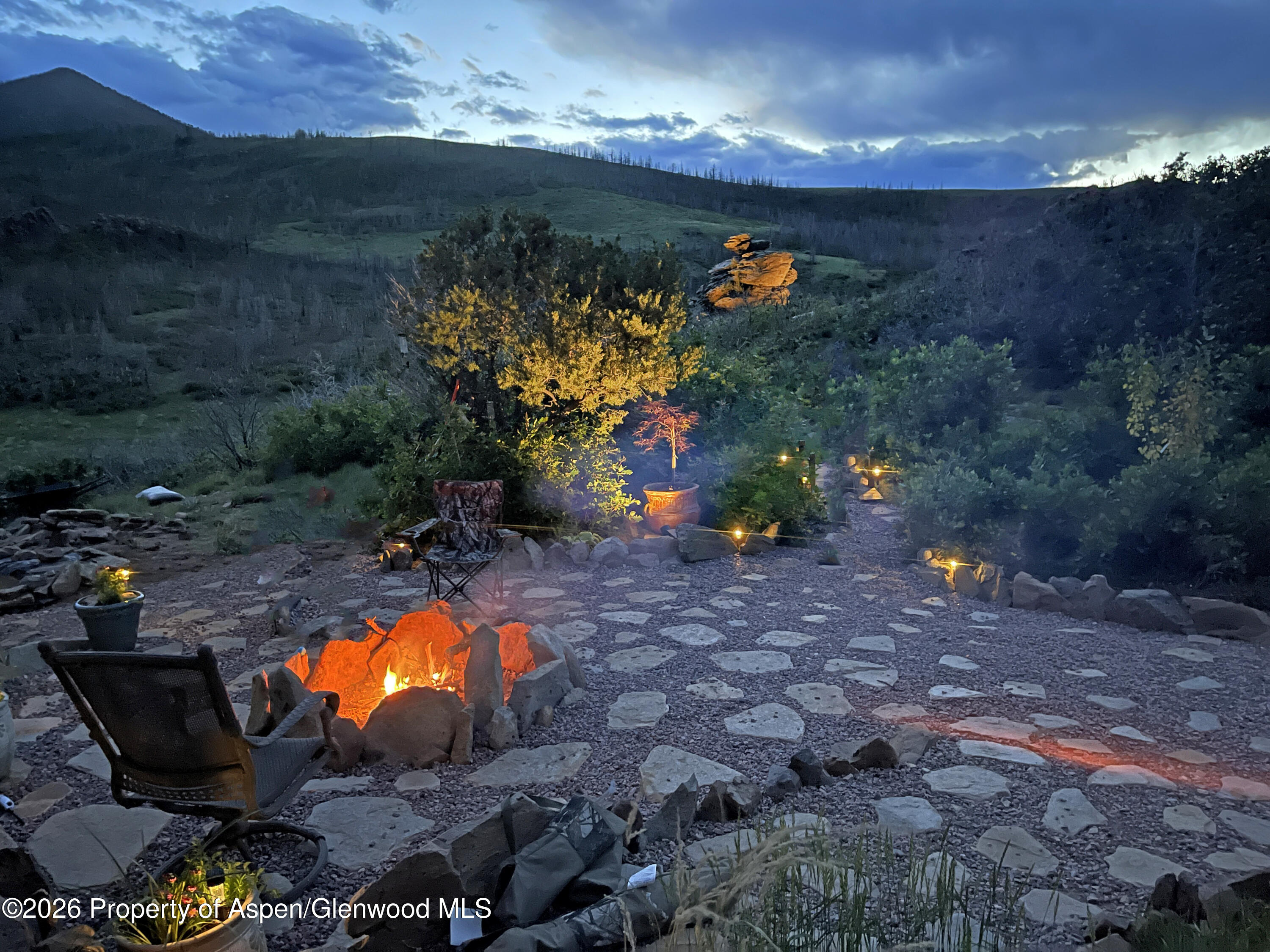 1833 Yellowstone Creek Road Gardner, CO 81040 - Photo 47 of 50 a view of swimming pool outdoor seating and mountain in the back