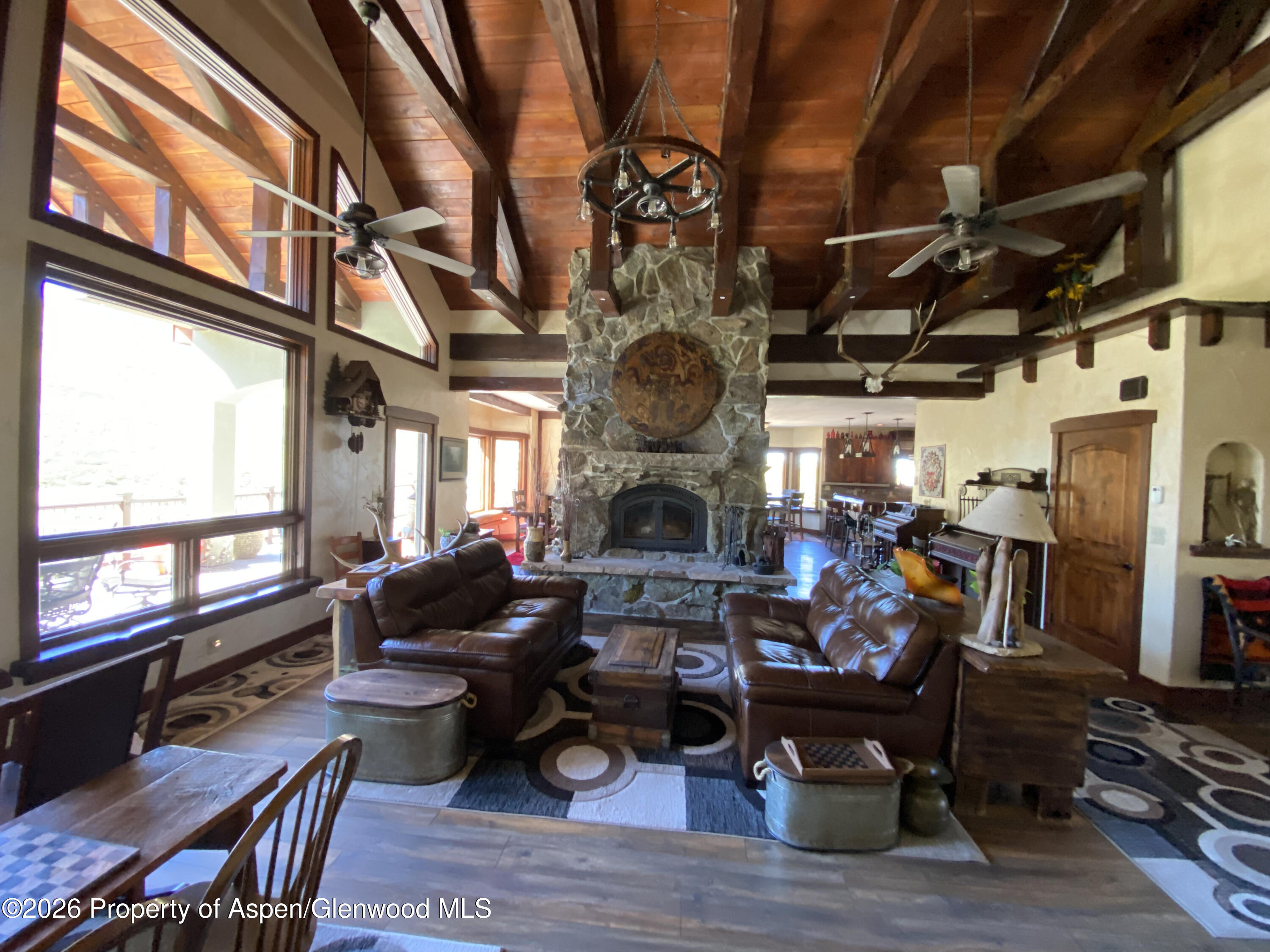 1833 Yellowstone Creek Road Gardner, CO 81040 - Photo 5 of 50 a living room with lots of furniture and a fireplace