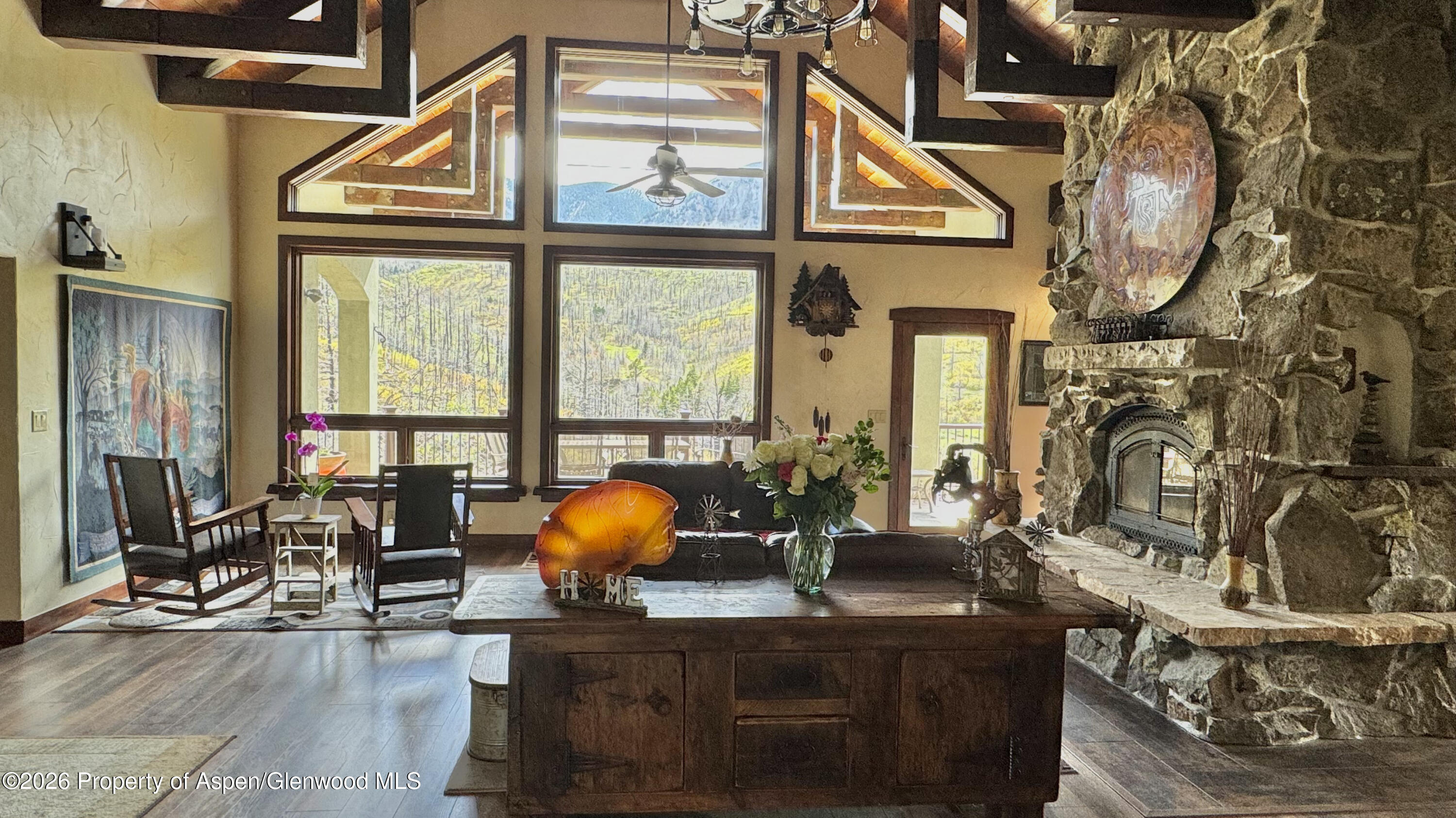 1833 Yellowstone Creek Road Gardner, CO 81040 - Photo 8 of 50 a view of a living room with furniture and floor to ceiling window