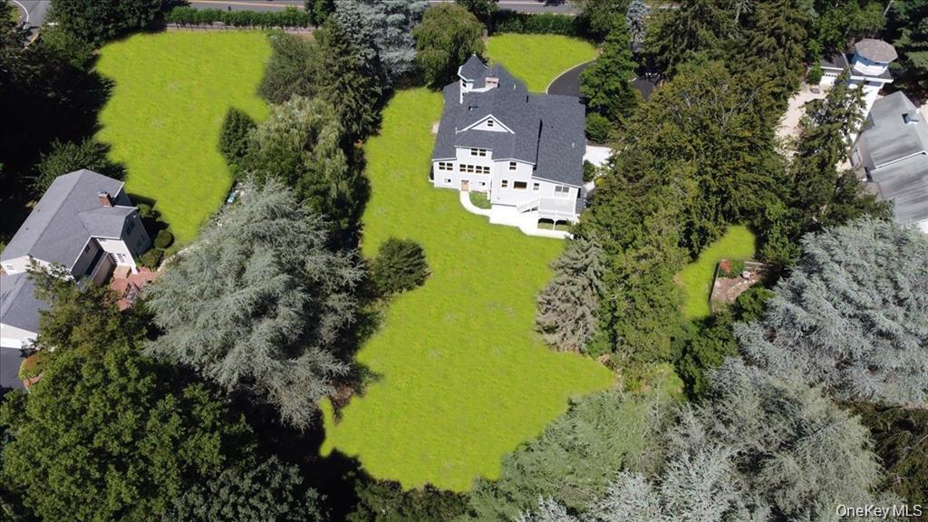 87 Dunlop Road Huntington, NY 11743 - Photo 29 of 31 an aerial view of a house with a yard swimming pool outdoor seating and yard