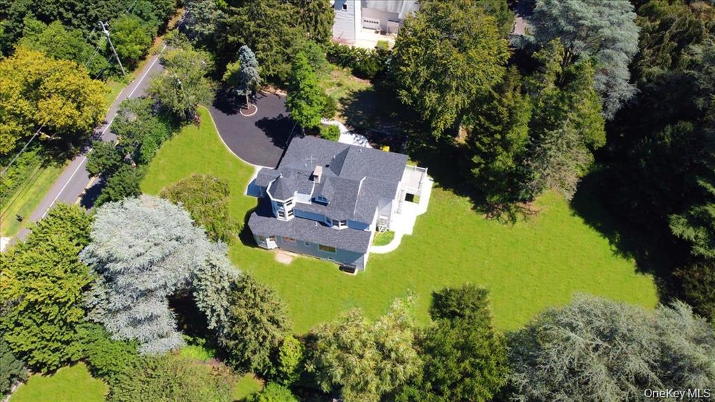 87 Dunlop Road Huntington, NY 11743 - Photo 30 of 31 an aerial view of a house with a yard