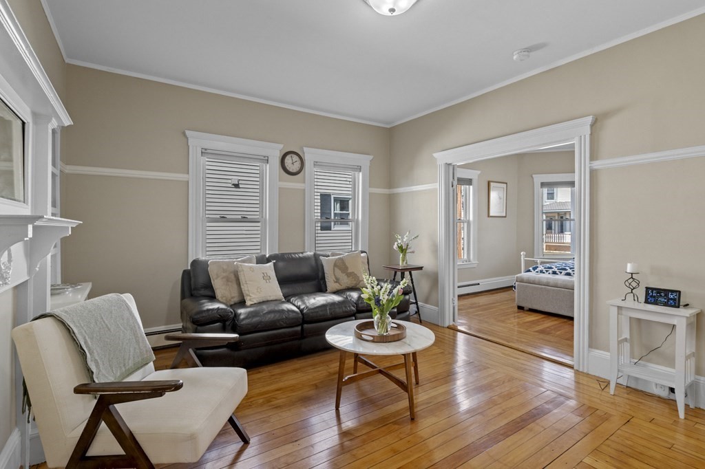 6 8 1/2 Devon Avenue, Unit 2 Beverly, MA 01915 - Photo 3 of 20 a living room with furniture