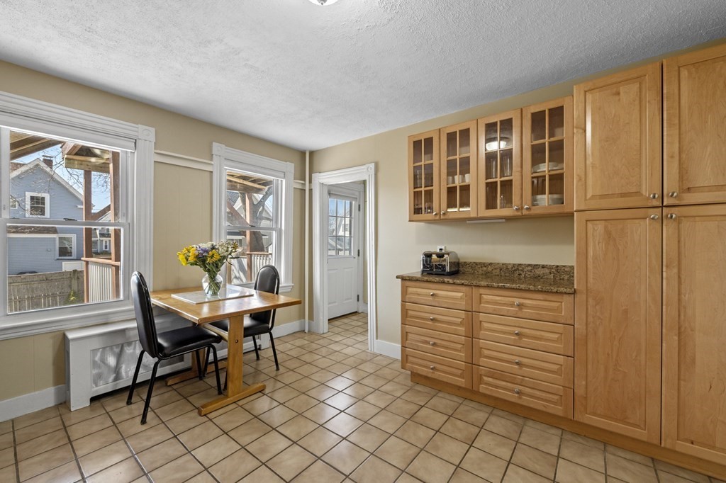 6 8 1/2 Devon Avenue, Unit 2 Beverly, MA 01915 - Photo 10 of 20 a workspace with furniture