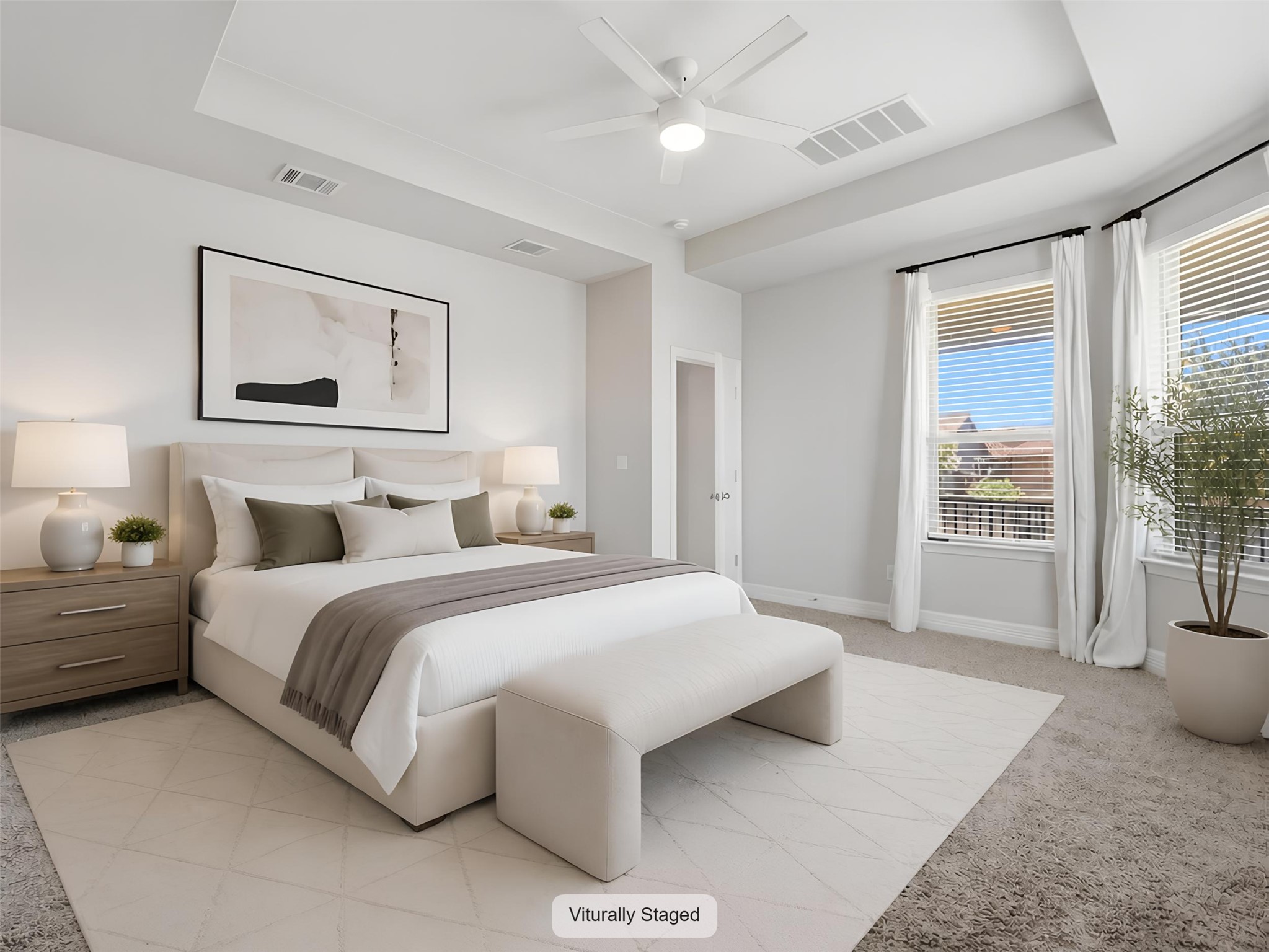 2132 Ringstaff Road Leander, TX 78641 - Photo 10 of 39 Enjoy peaceful relaxation in this well-lit bedroom featuring a spacious tray ceiling and carpeted flooring.