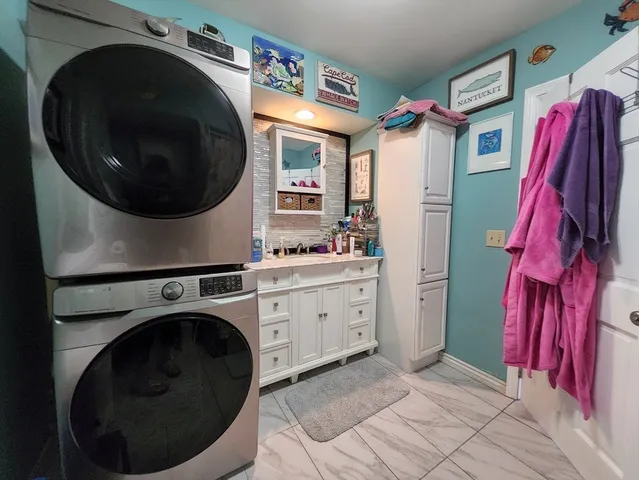 a utility room with dryer and washer