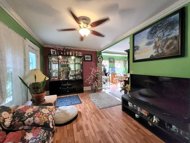 a bed room with a bed and a television