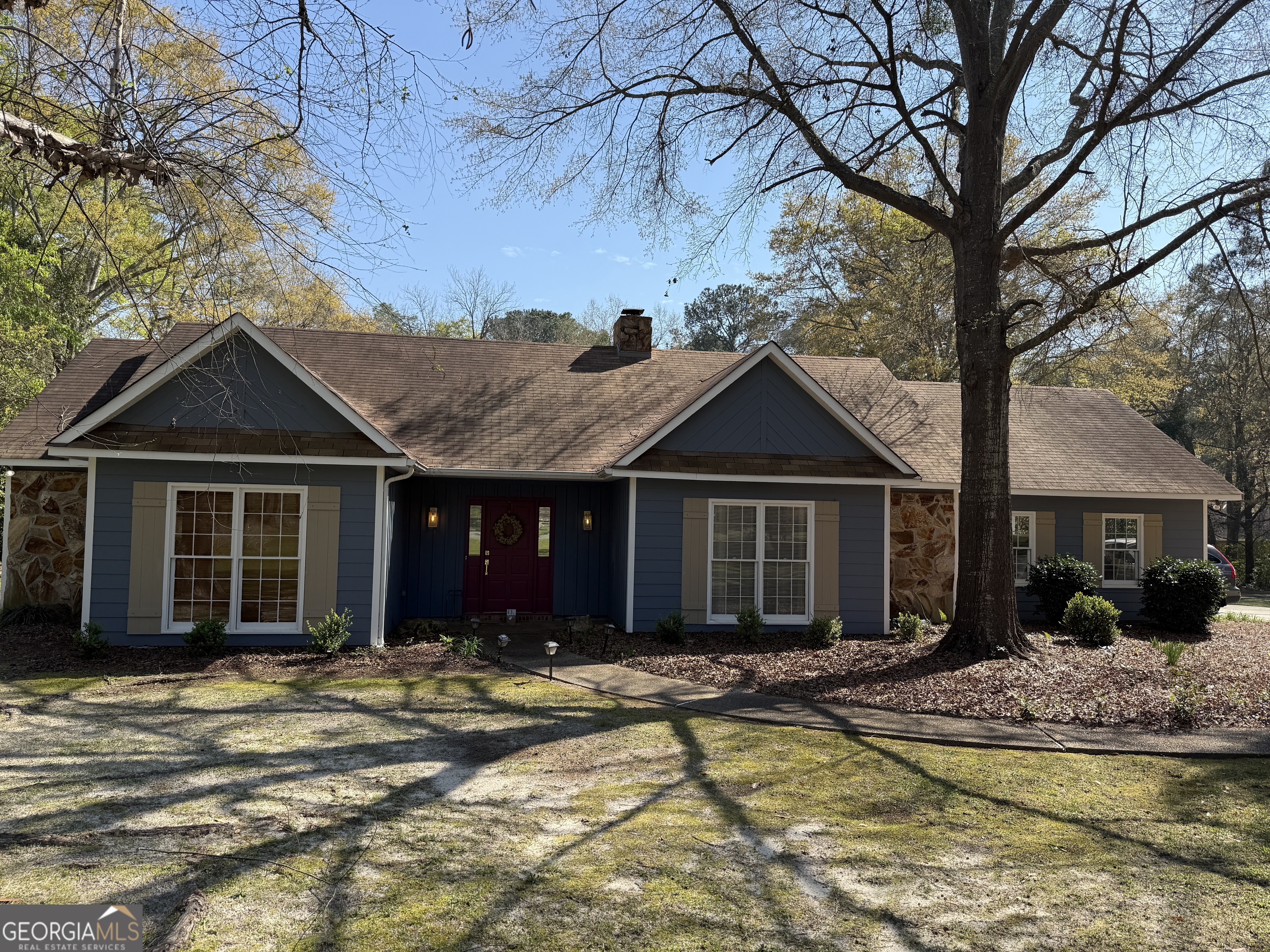 front view of a house with a yard