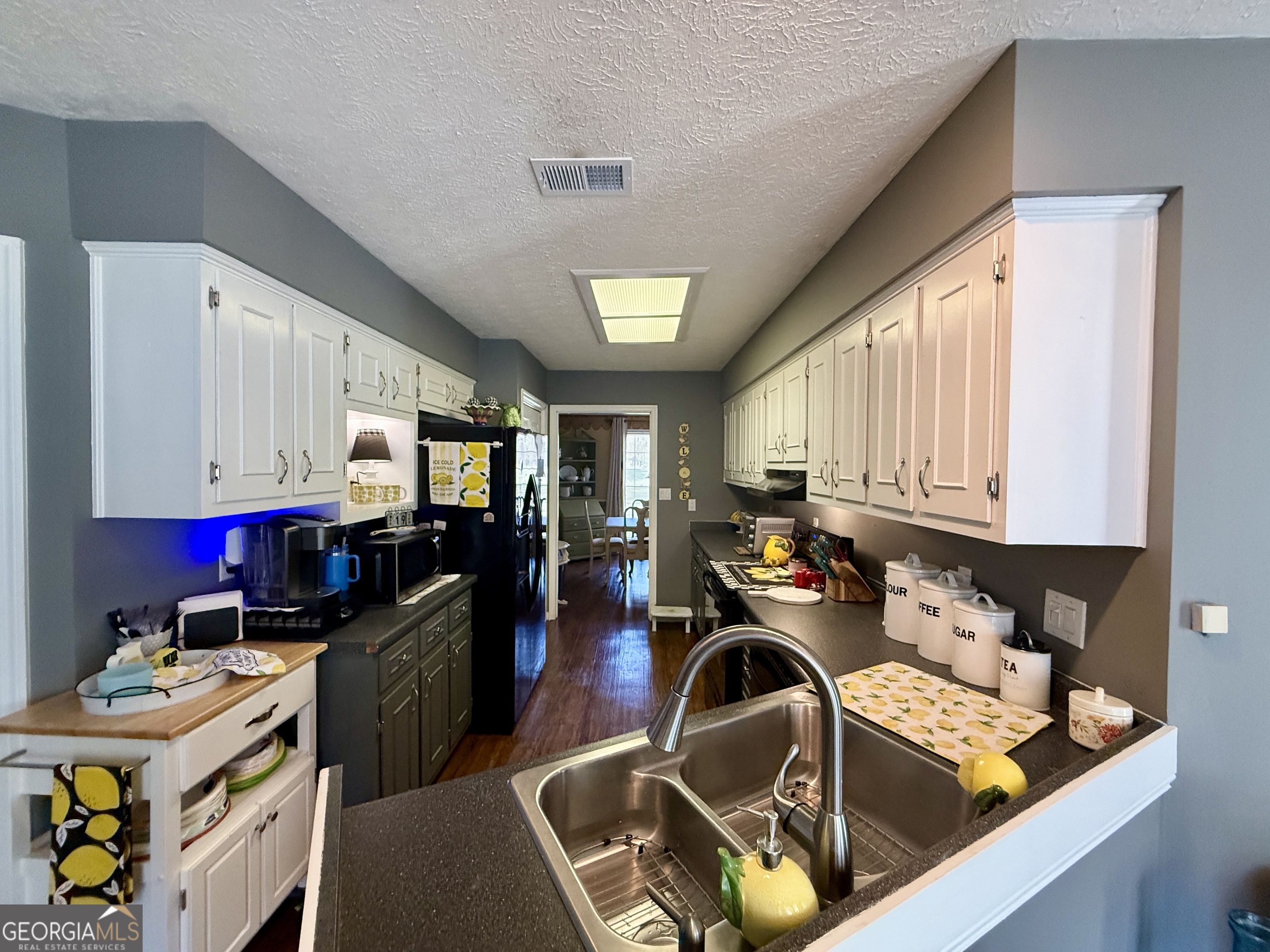 104 Monte Place Cordele, GA 31015 - Photo 16 of 52 a view of a kitchen with furniture and a window
